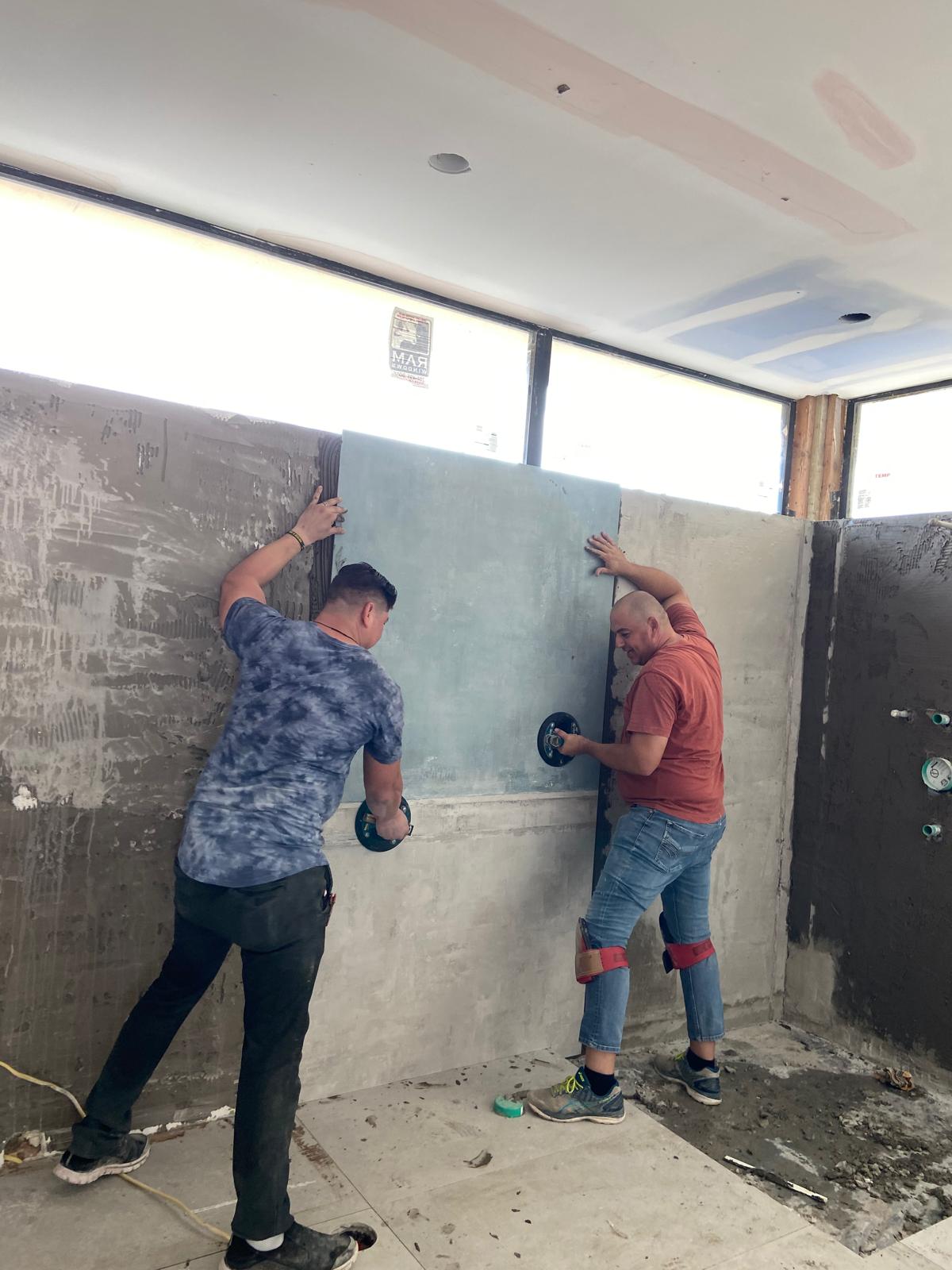Large-format tile wall installation