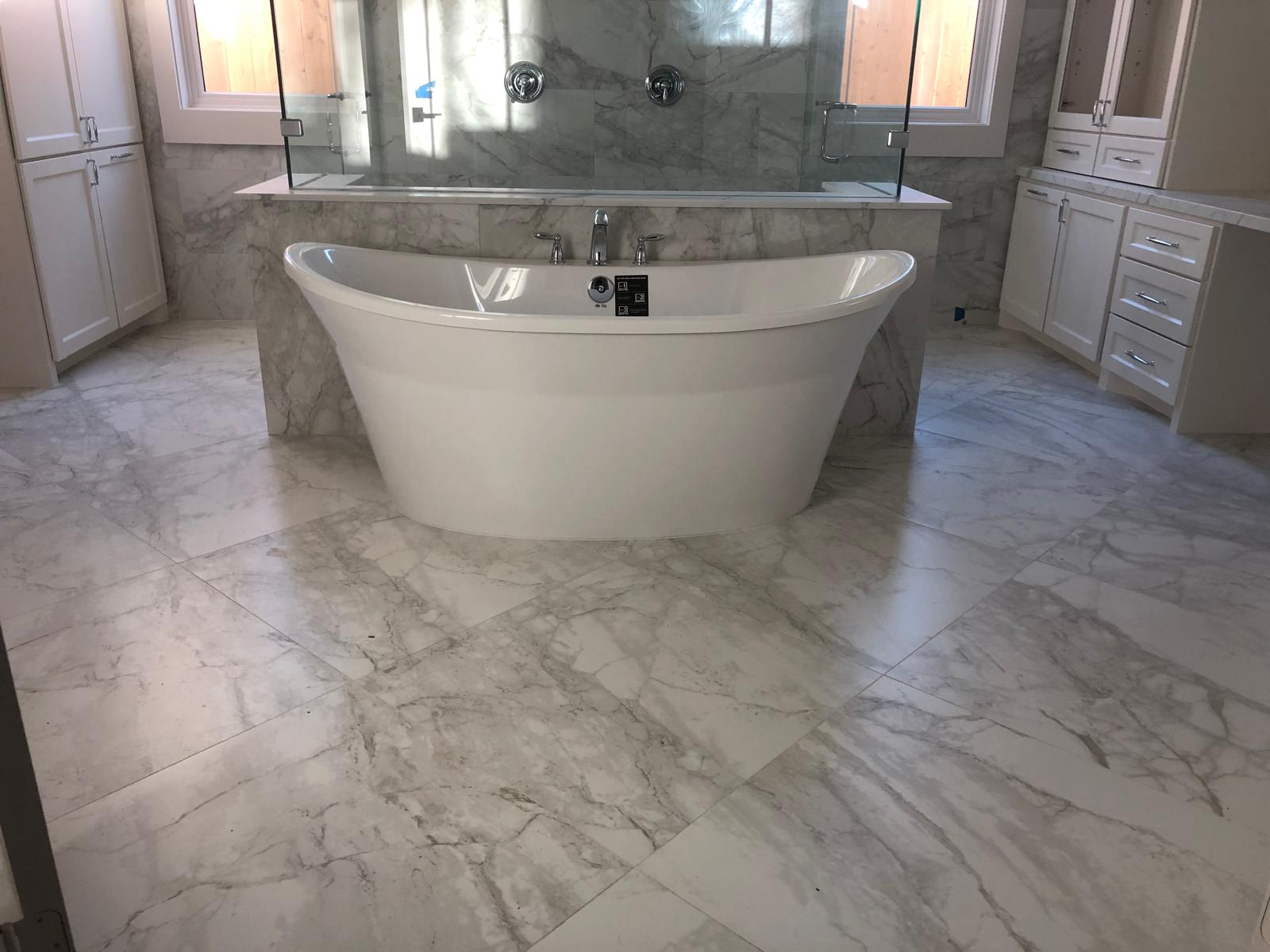 Marble bathroom with freestanding tub
